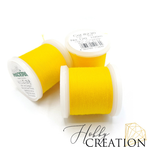 Нитки швейные Madeira Aerofil №120, 8230 (желтые) Нитки швейные Madeira Aerofil №120, 8230 (желтые)